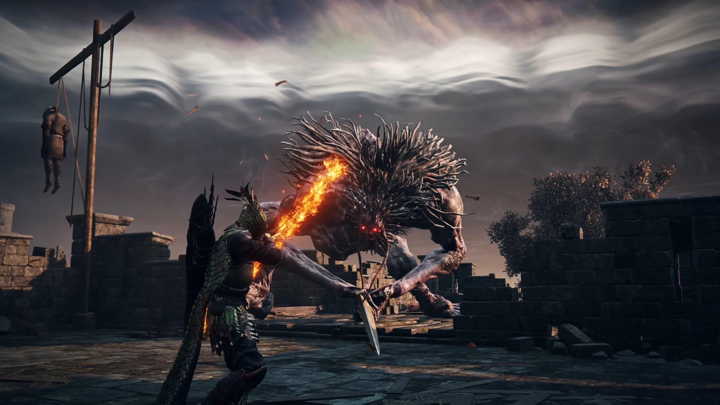 IRoneye zielt auf einen flammenden Schuss auf einen riesigen Troll in einem Screenshot von Elden Ring Nighteign
